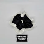 Elegance – Black Silk-Style Scrunchie with Pleated White Trim