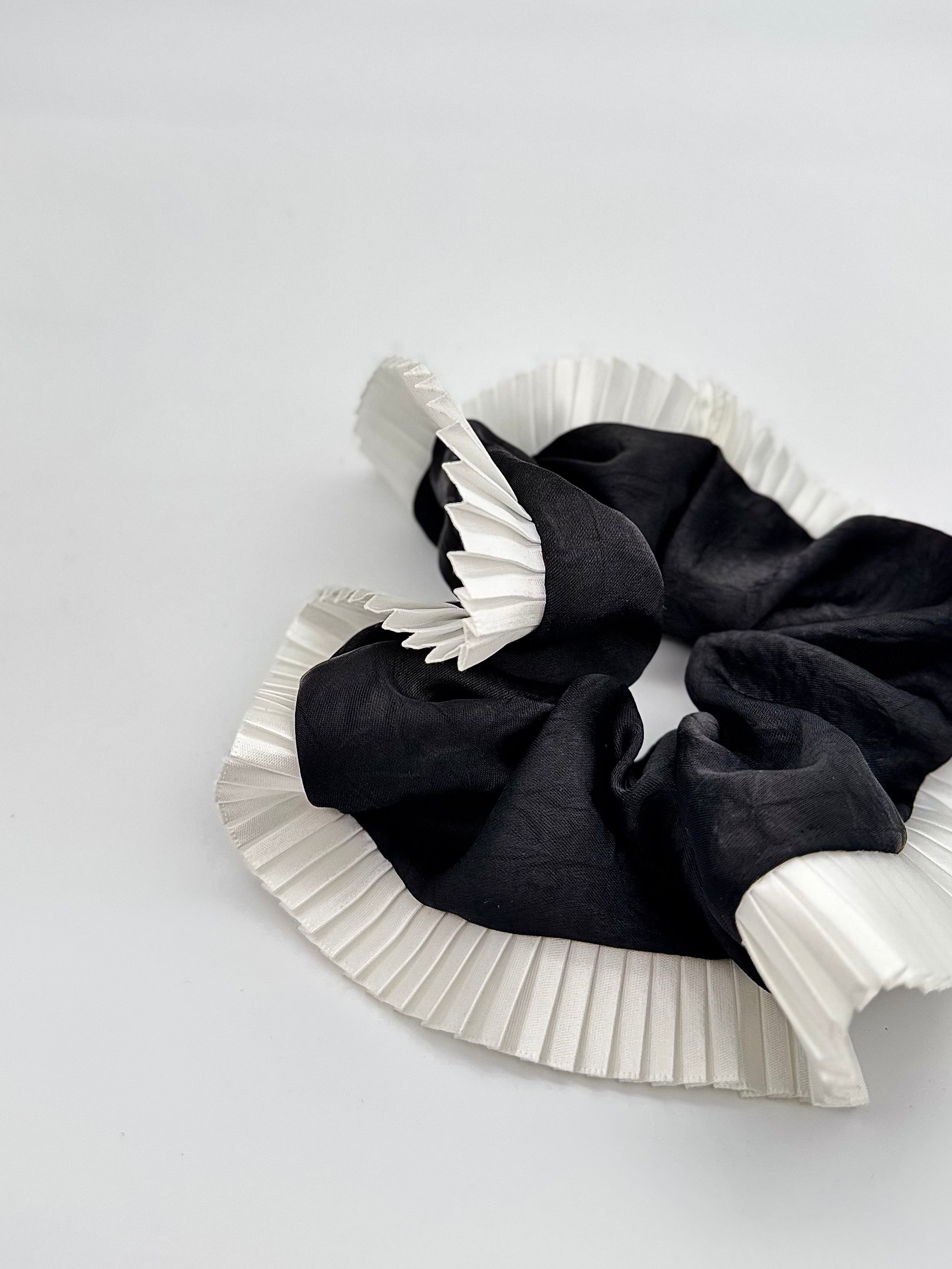Elegance – Black Silk-Style Scrunchie with Pleated White Trim
