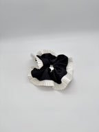 Elegance – Black Silk-Style Scrunchie with Pleated White Trim