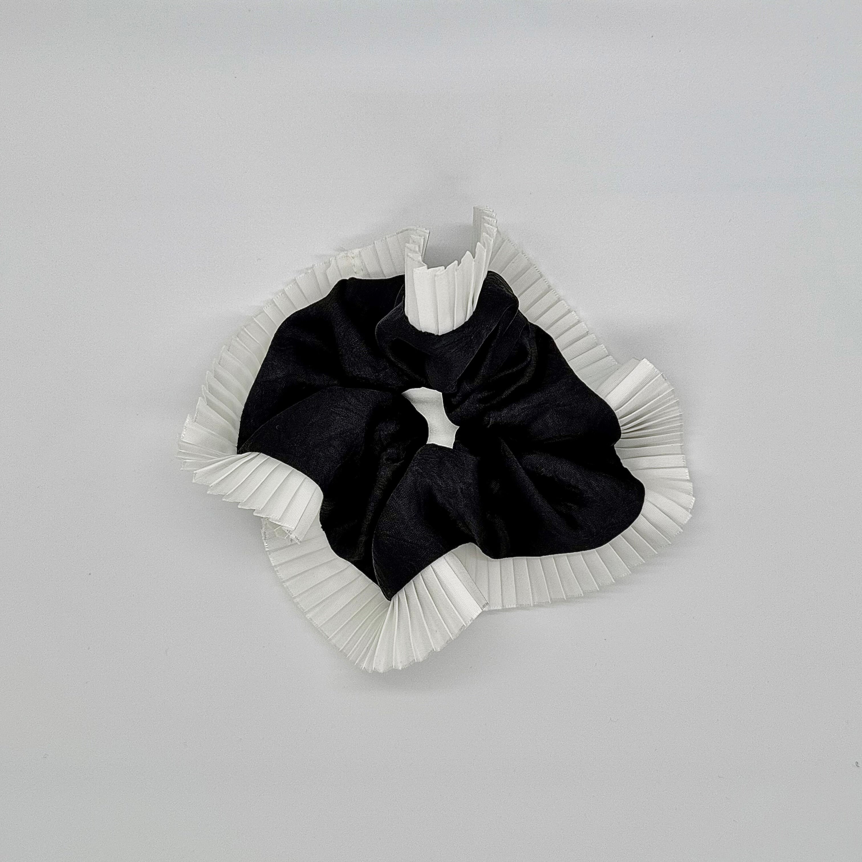 Elegance – Black Silk-Style Scrunchie with Pleated White Trim