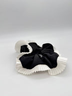 Elegance – Black Silk-Style Scrunchie with Pleated White Trim