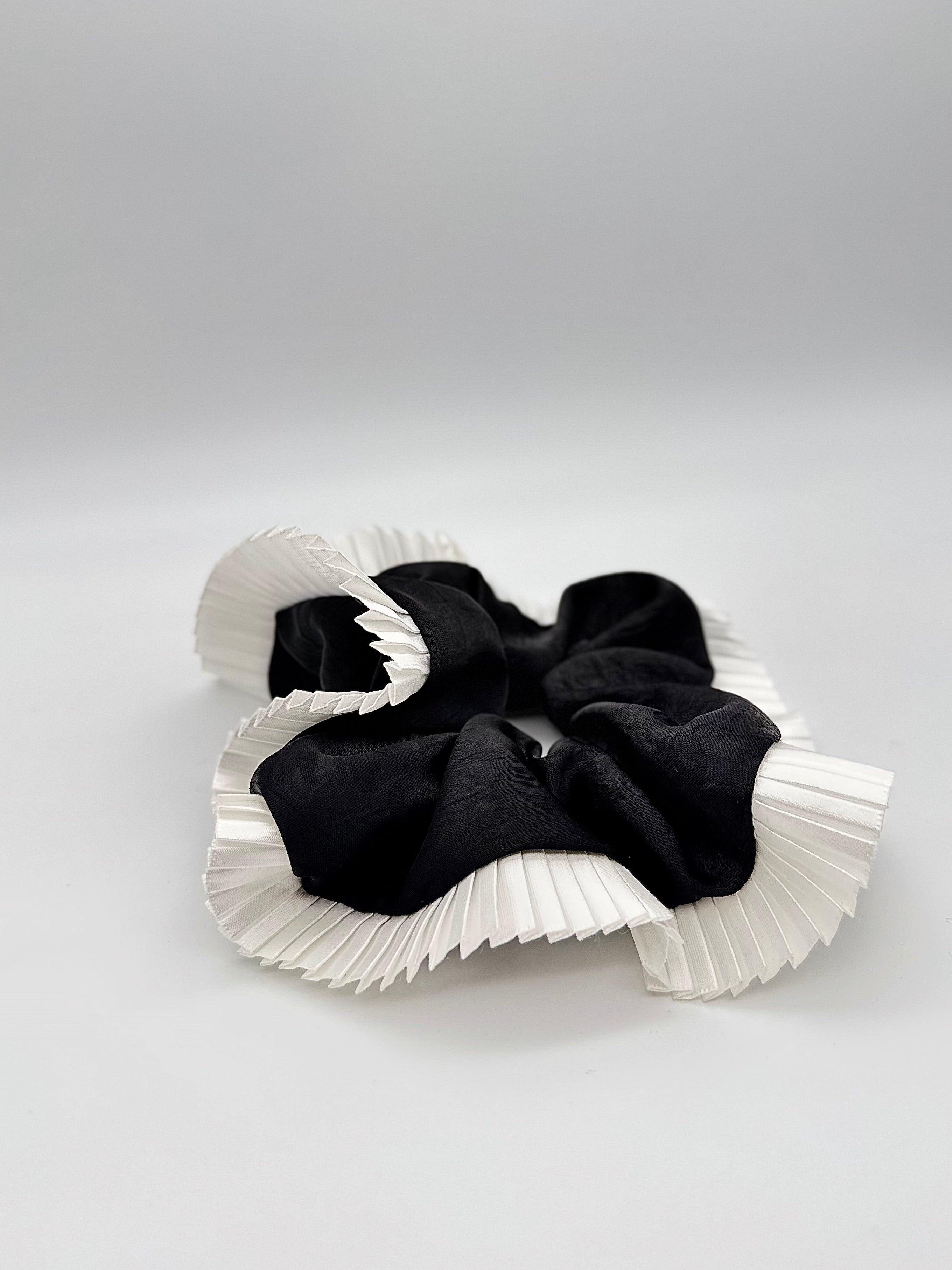 Elegance – Black Silk-Style Scrunchie with Pleated White Trim